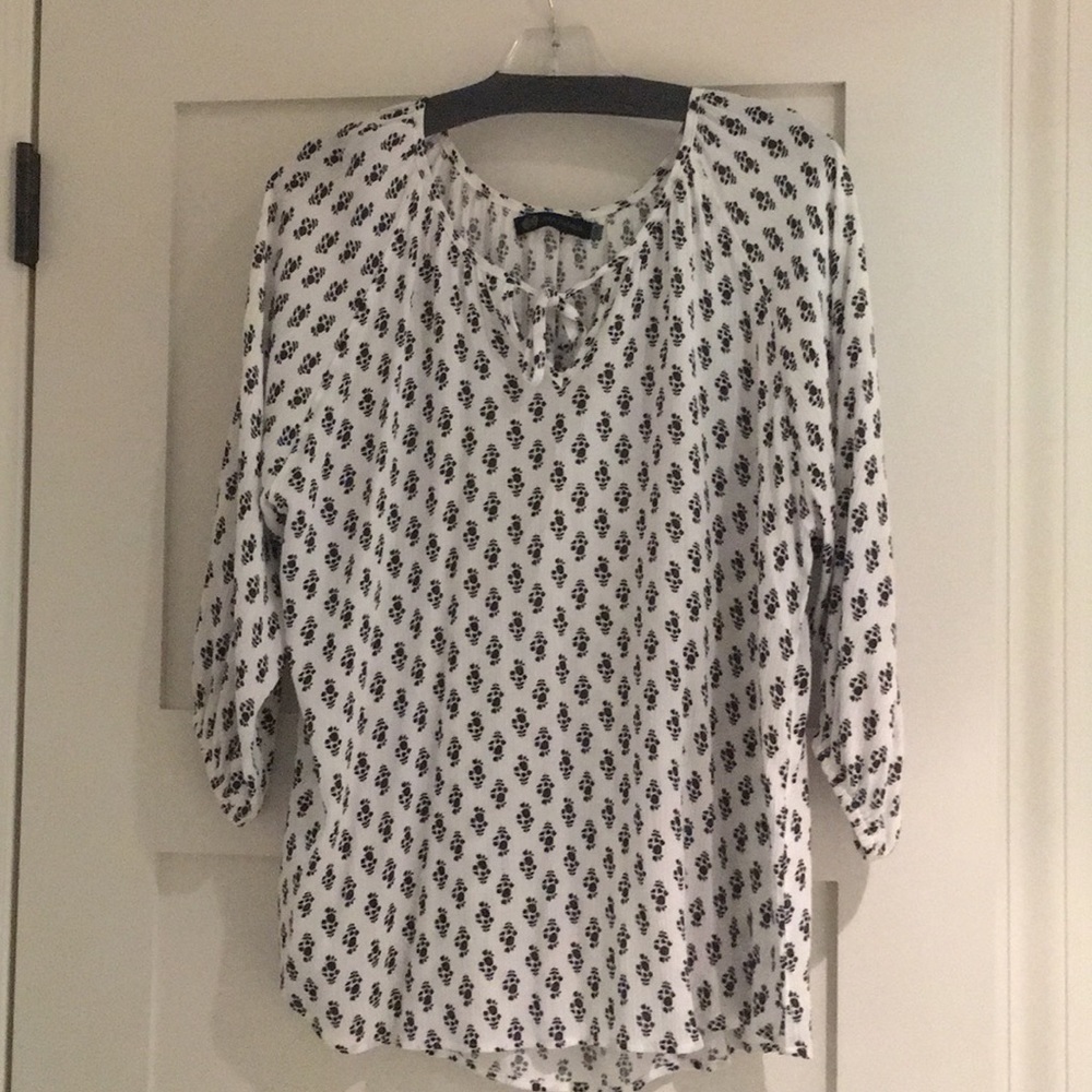 John Eshaya JET black and white blouse